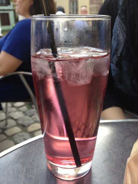 Basically Italian soda with flat water, but it tastes so much better than that description.